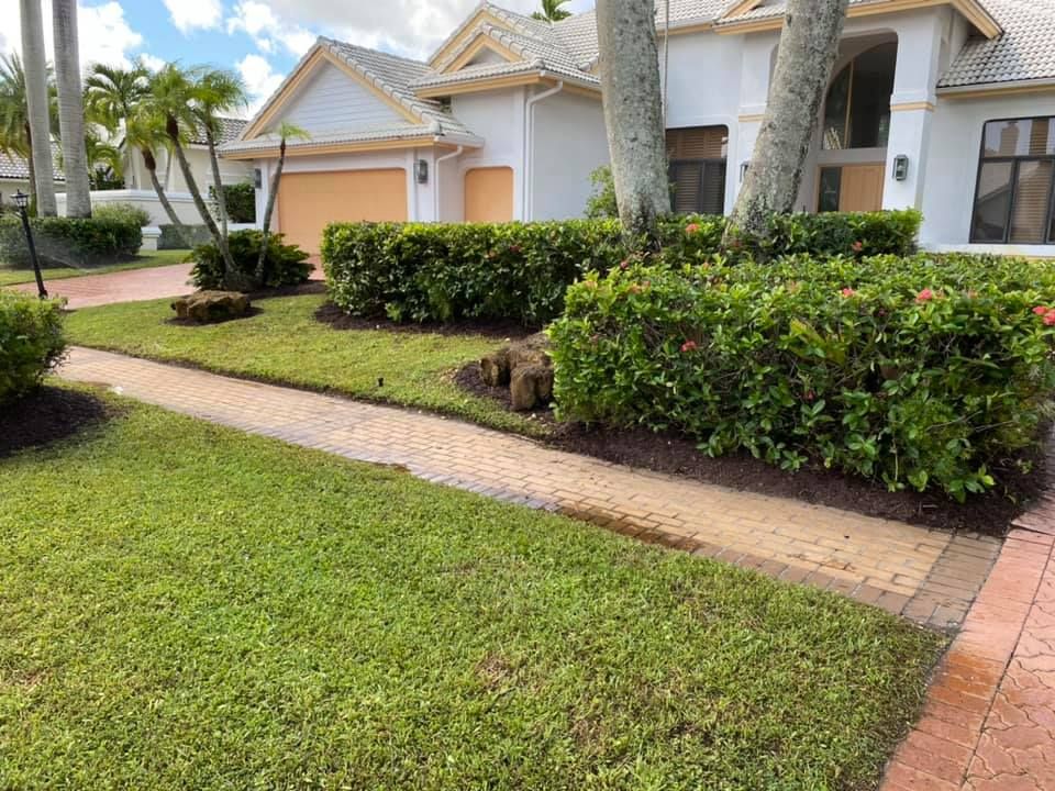 Our Shrub Trimming service expertly shapes and maintains your shrubs, enhancing curb appeal while promoting healthy growth. Trust our skilled team to keep your garden vibrant and thriving all year round. for An Extravagant Landscape & Lawn Service in Delray, FL