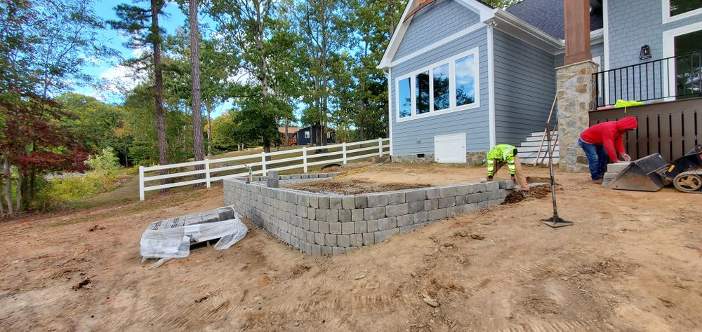 Enhance your outdoor space with our expert retaining wall construction services. We design and build durable walls that prevent soil erosion and add aesthetic appeal to your landscape at affordable rates. for RA Lawn Care, Landscape & Hardscape in Littleton, NC