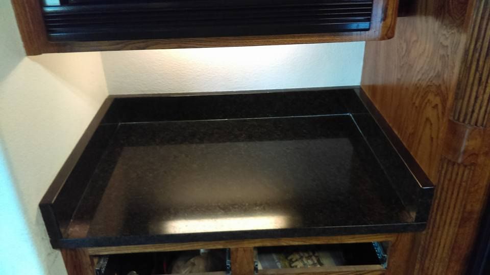 Our Countertop Installation service offers homeowners expert craftsmanship and high-quality materials to transform their kitchen or bathroom with a beautiful, durable, and functional countertop that enhances their living space. for Omega Granite LLC in Ravenna, TX