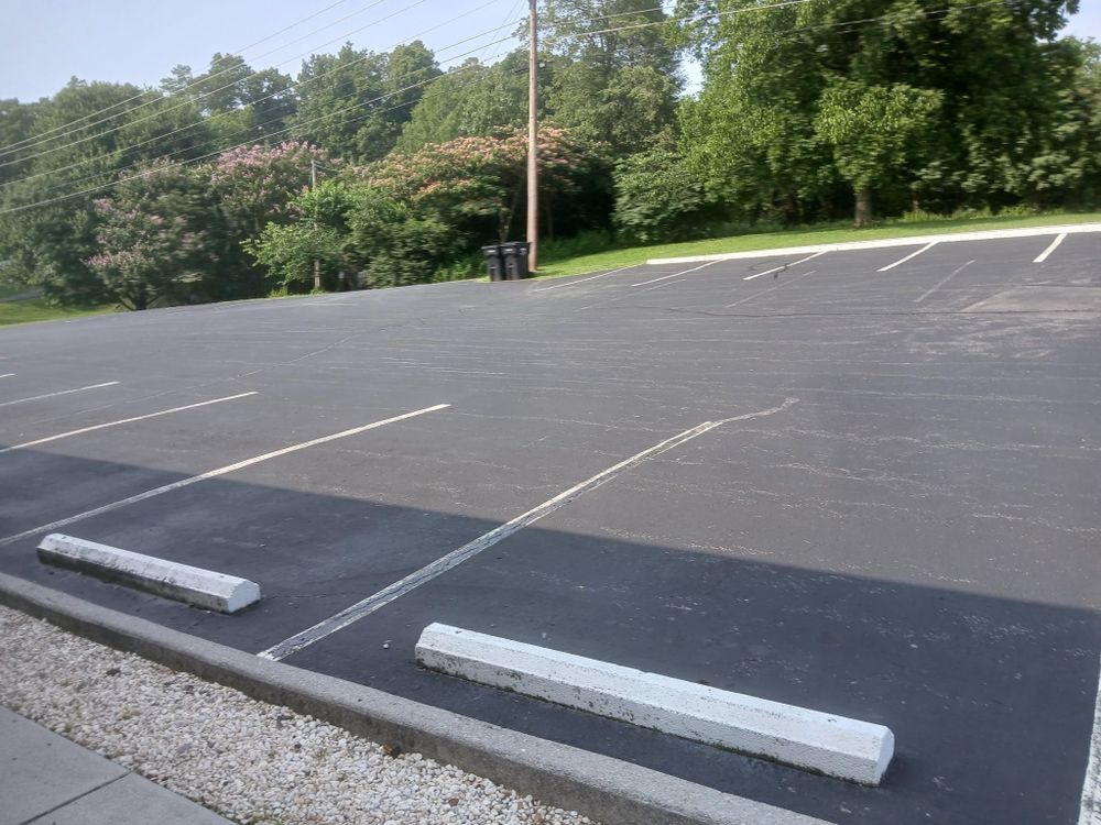 Enhance your property's curb appeal and safety with our professional line striping service, ensuring precise, long-lasting markings for parking areas, driveways, and walkways. Trust us to clearly define every space. for Asphalt Animals in Sevierville, TN