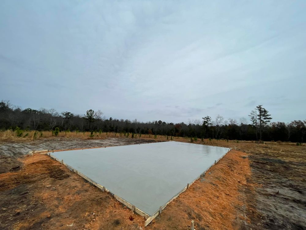 Our concrete services offer homeowners durable, high-quality installations for driveways, patios, and walkways. Enhance your home's curb appeal with our expert craftmanship and reliable solutions designed to withstand the test of time. for Palmetto Precision Concrete & More in Bethune, SC