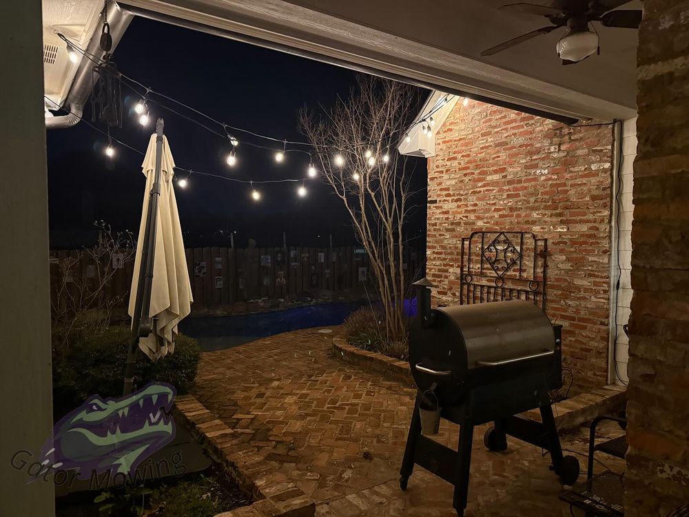 Our patio design & construction service transforms your outdoor space into a beautiful, functional area perfect for relaxation and entertainment, ensuring quality craftsmanship and personalized designs that complement your home’s aesthetic. for Gator Mowing in Bossier City,  LA