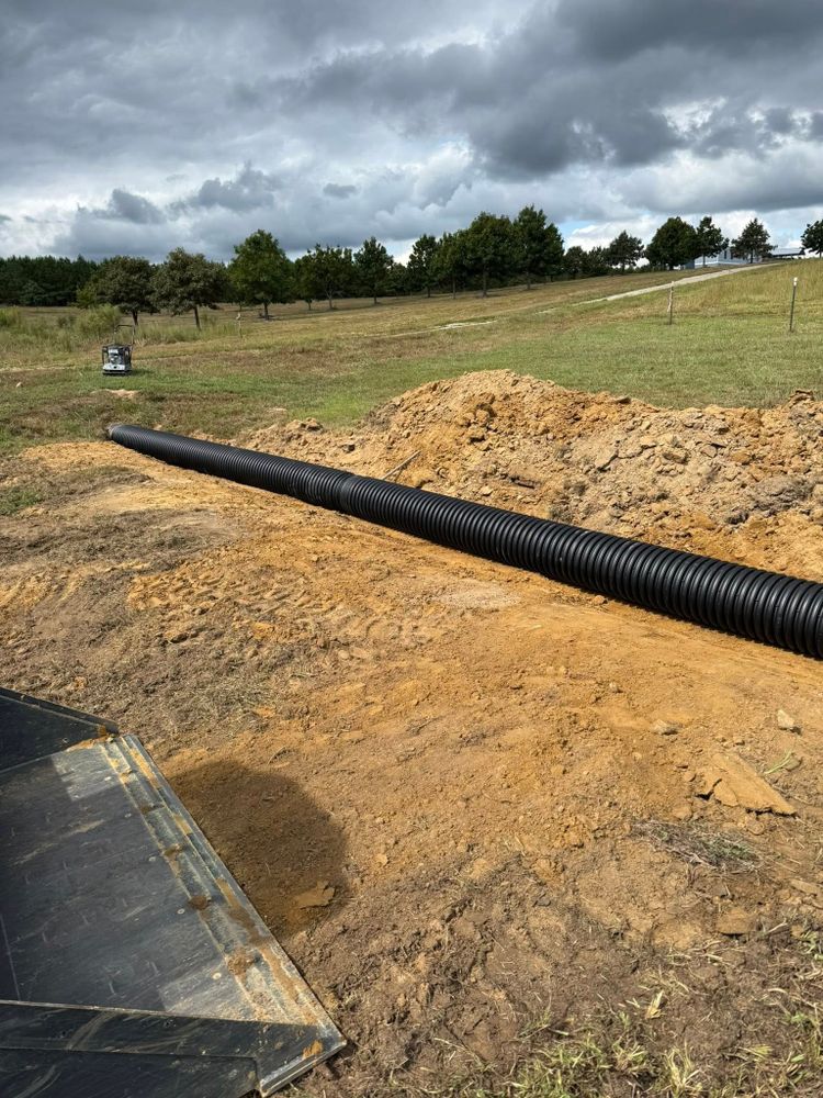 Our trenching service efficiently creates precise, clean-cut trenches for utility installations or drainage solutions, ensuring minimal disruption to your property while maintaining safety and adhering to strict timelines. for Advantage Rental And Services in Youngsville, NC