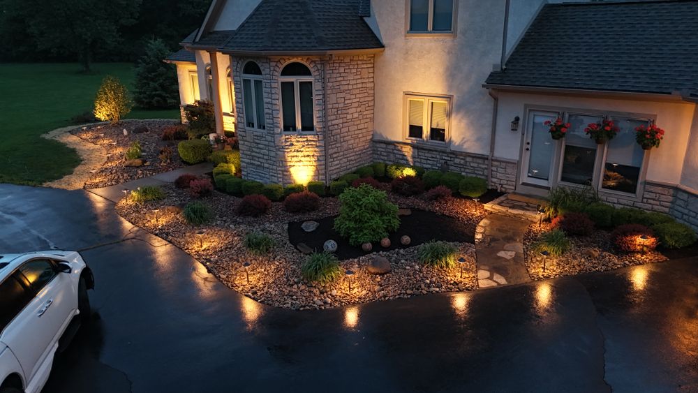 Enhance your home's exterior with our expert landscape lighting services, a perfect complement to our landscaping solutions, providing stunning illumination while increasing safety and curb appeal after dark. for Elevate Landscape & Hardscape in West Jefferson, OH