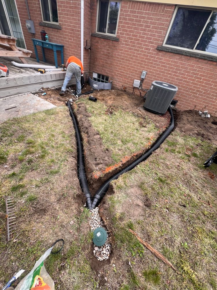 Buried downspouts for Alltimate Outdoor Services in Warren, MI