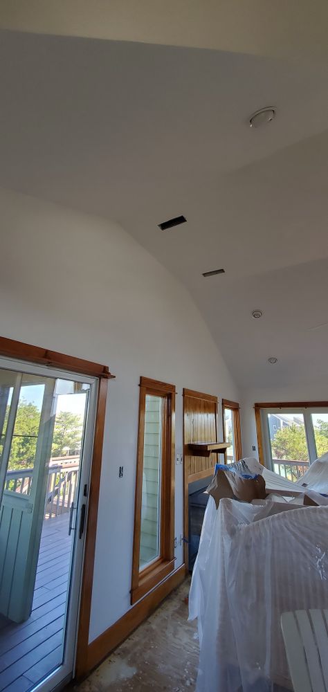 Our expert drywall service ensures flawless surfaces, ready for pristine painting. We handle repairs, installations, and finishing with precision to enhance your home's aesthetics and value effortlessly. Transform your space today! for Silva Painting Company in Kitty Hawk, NC