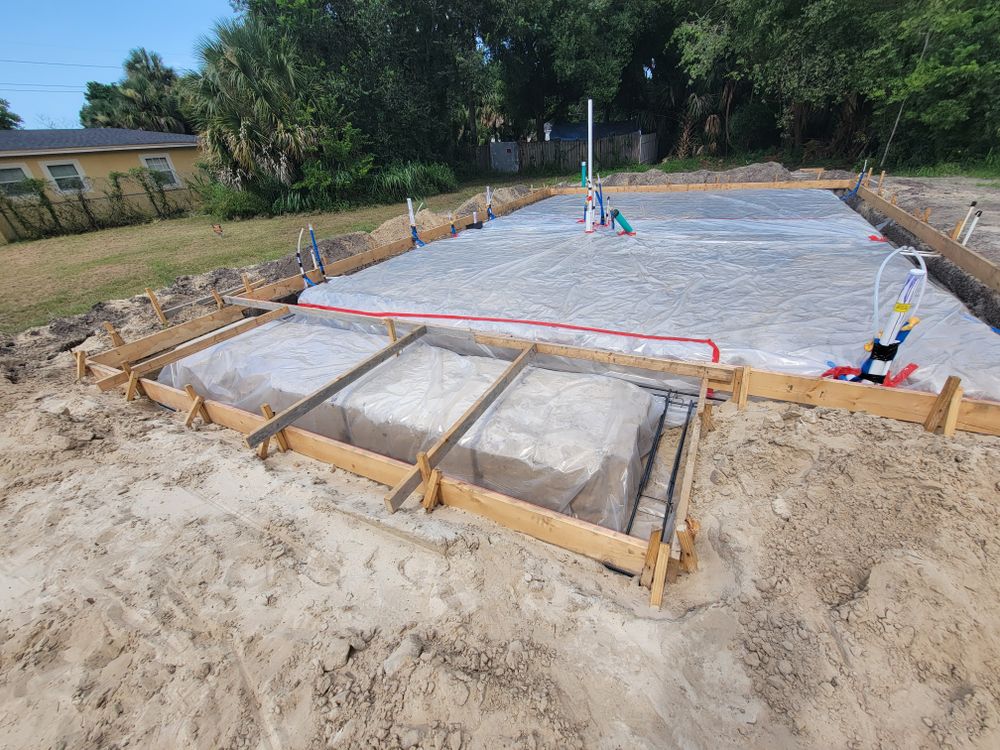 Our House Pads service provides expertly crafted, durable concrete foundations tailored for residential homes, ensuring long-lasting stability and structural support to meet your specific building needs. Trust us for superior quality and reliability. for Downer Site Services in Sanford, FL