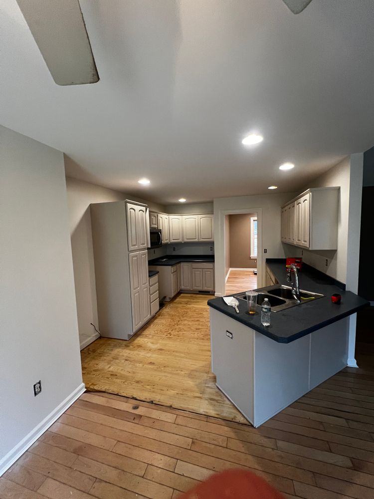 Transform your kitchen affordably with our cabinet refinishing service. We clean, repair, sand, and apply durable finishes that refresh cabinets beautifully, giving homeowners a like-new look without full replacement costs. for Green Valley Painting in Thompson, CT
