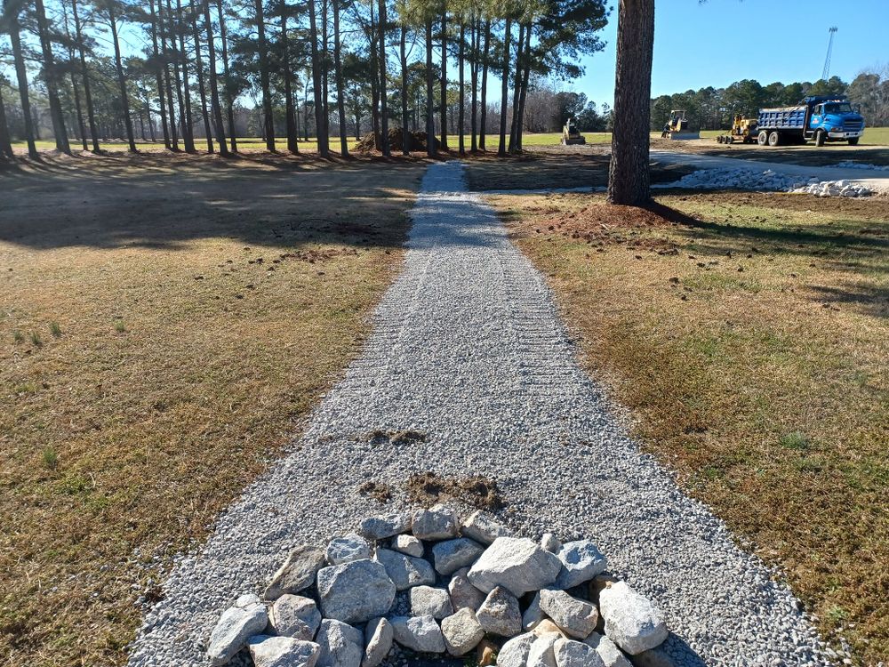 We offer professional grading services to ensure your property is level and prepared for construction, enhancing the efficiency and success of any land clearing project you have planned. for JT Todd Grading in Zebulon, NC