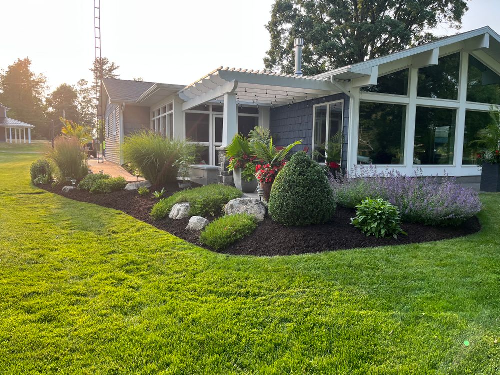 Our Landscape Design service takes your outdoor space to the next level with custom plans tailored to enhance your property's aesthetic appeal and functionality, creating a beautiful, cohesive design. for T.N.T Lawn Care, LLC in Wolcottville, IN