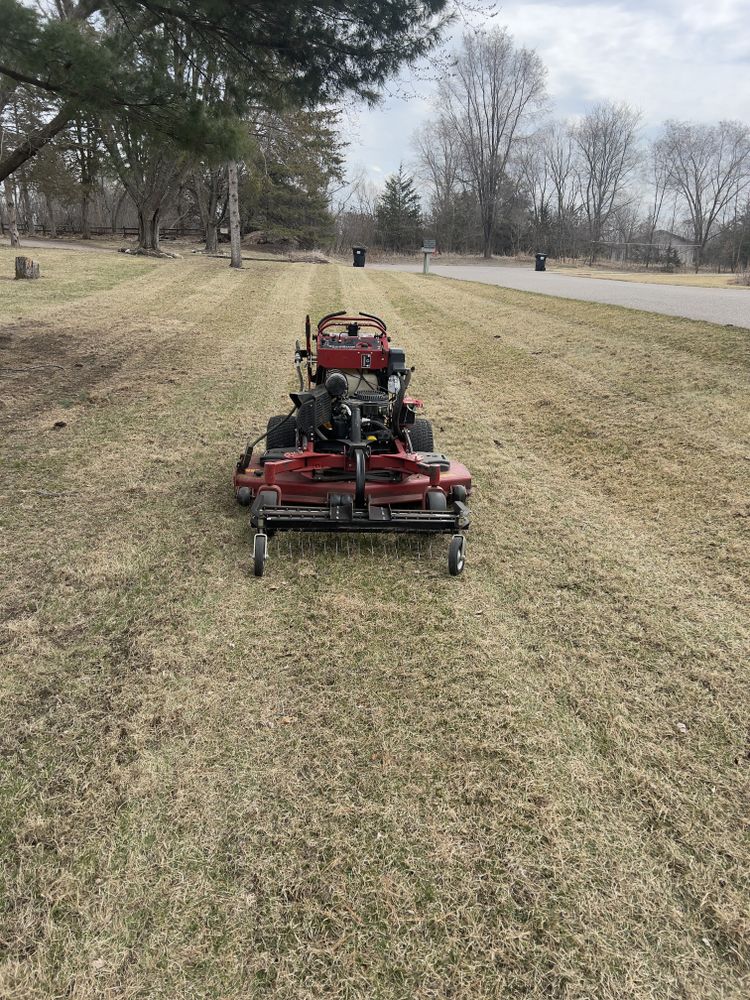 Our Dethatching service removes dead grass and organic debris, promoting healthy lawn growth by improving air circulation and nutrient absorption. Transform your yard into a lush, vibrant space with expert care. for Luke's Lawn Care and Landscape in Andover, MN