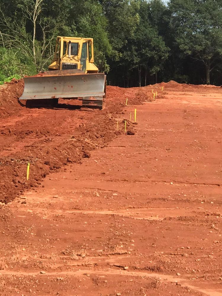 Our grading service ensures your property's landscape is leveled and properly sloped for optimal drainage, erosion control, and aesthetic appeal. Trust us to transform your land effectively and efficiently. for Brown & Sons Grading in Danielsville, GA