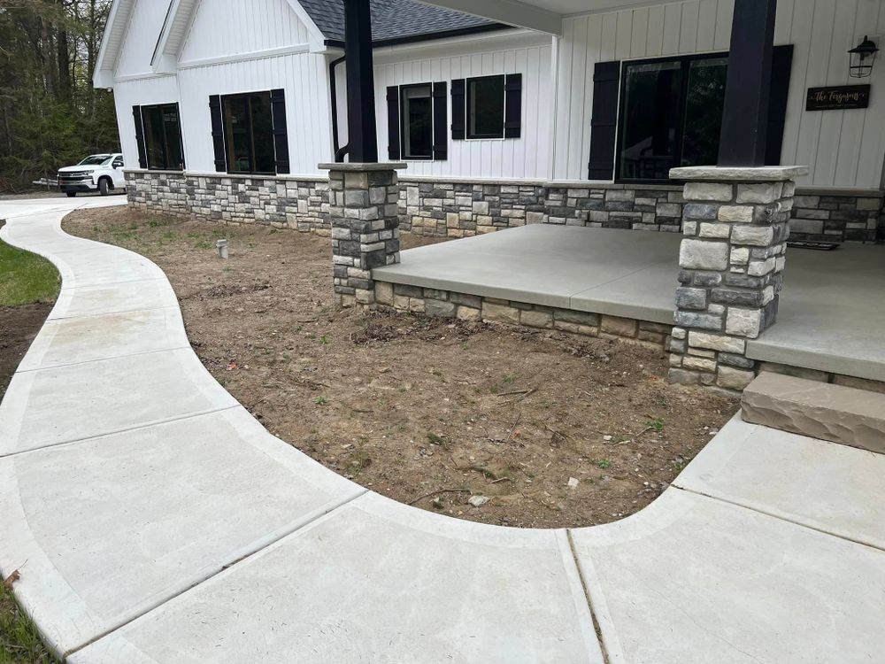 Revamp your outdoor living space with our expert Patio Design & Construction service. Elevate your home's aesthetics and functionality while enjoying high-quality craftsmanship and personalized designs tailored to your preferences. for Brogan's Landscape Construction in Oxford,, MI