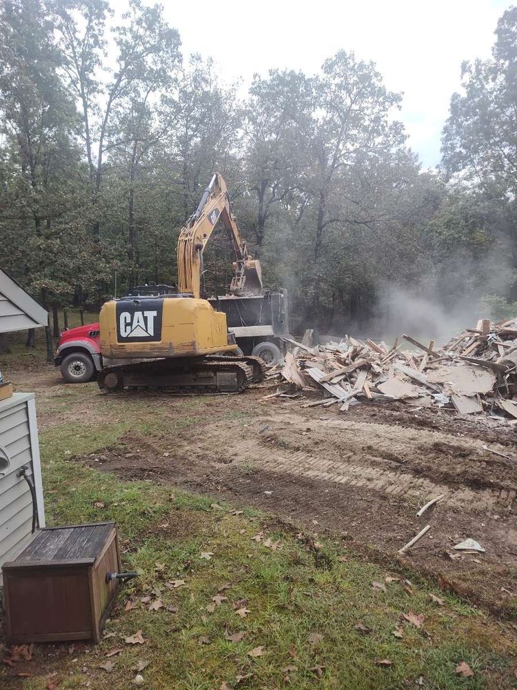 Our Land Clearing & Demolition service efficiently prepares your property for new projects, ensuring safe and environmentally-friendly removal of unwanted structures, debris, and vegetation for a fresh landscape start. for JUSTIN JACQUES LLC DBA DOUBLE J EXCAVATION in Nashville, AR