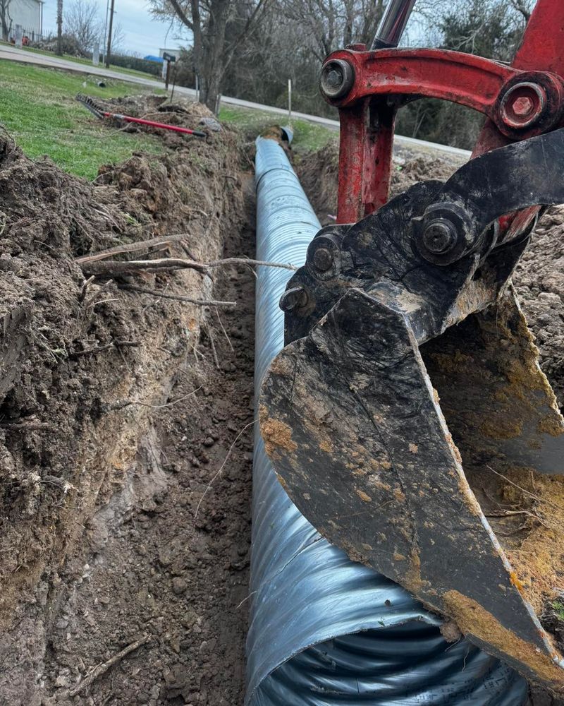 Our Storm Services provide efficient debris removal, drainage solutions, and restoration for your property, ensuring a quick recovery after storms while enhancing safety and preventing future damage to your home. for Dovers Dirt Dynamics in Franklin, TX