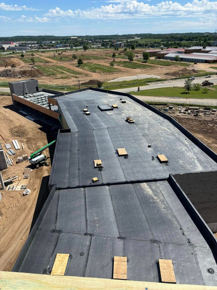 Our roofing repairs service provides expert solutions for leaks, failed or missing patches, and damaged areas to ensure a safe and secure roof that protects your business from the elements. for Elmcrest Construction in Harris,  MN