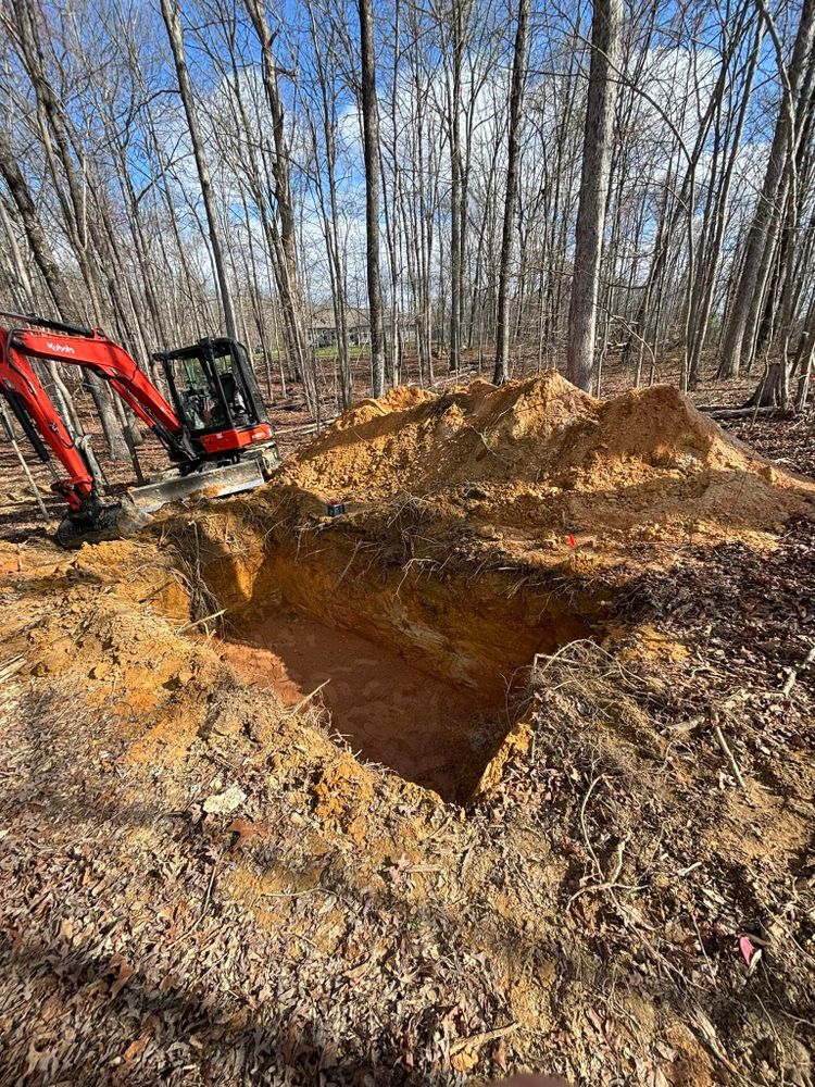 Our Footers service includes digging and installing solid foundations for your new construction project, ensuring stability and longevity. Trust us to prepare your land effectively for optimal building results. for TD Dirtworks in Tracy City, TN