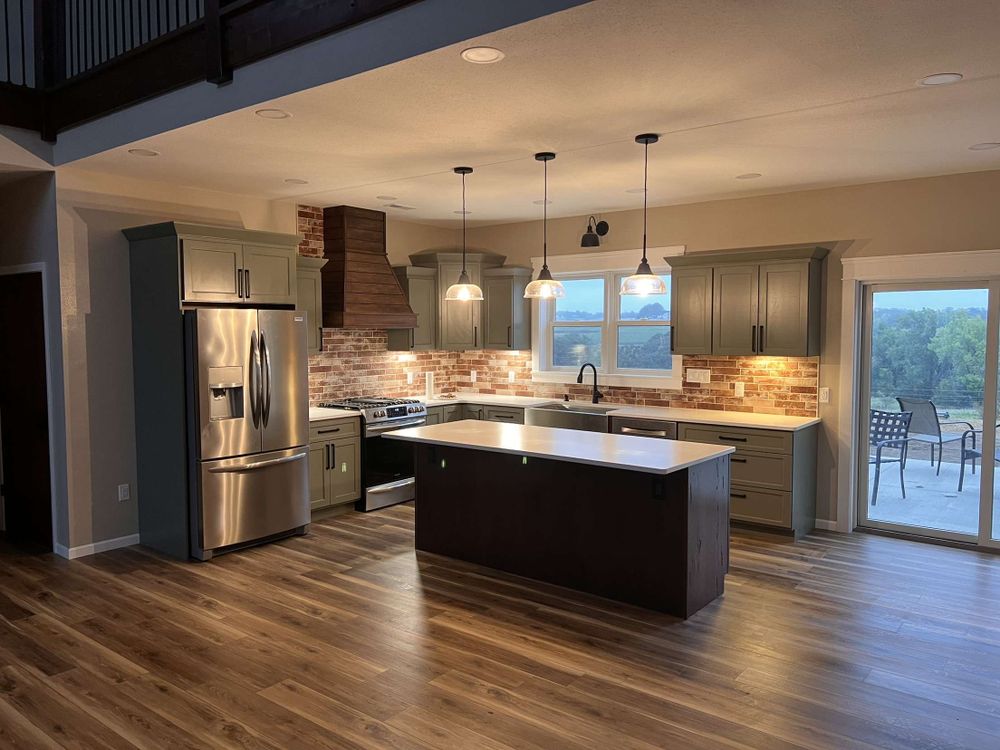 Transform your kitchen into a functional and stylish space with our expert renovation service. From updated cabinets to modern appliances, we'll bring your dream kitchen to life with quality craftsmanship. for Dow Construction in Clarinda ,   IA