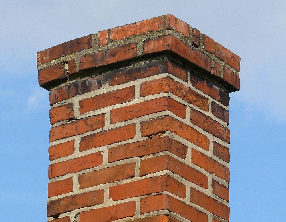 Our Chimney Repairs service ensures your chimney is safe, efficient, and durable by addressing structural issues, removing blockages, and preventing leaks to enhance your home's safety and functionality. for Elite Masonry & Drainage in New Haven, CT