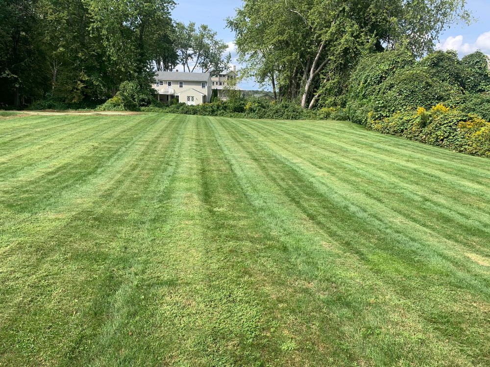 Our lawn mowing and maintenance service keeps your yard neat, healthy, and inviting with reliable scheduling, precise cuts, edging, trimming, and seasonal care tailored to your property’s unique needs. for Murray Mowing and More in Ashaway, RI