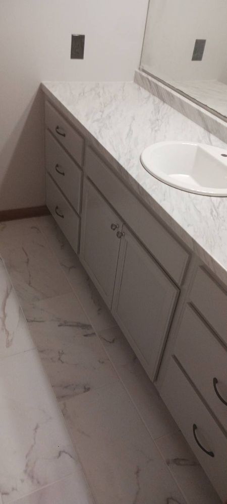 Revitalize your kitchen with our expert cabinet refinishing service, offering a cost-effective makeover. We transform dull surfaces into stunning focal points, enhancing aesthetics and value while ensuring durability and quality finishes. for Hightower Painting in Covington, TN