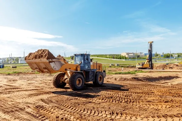 Our Dirt Work service expertly prepares your land for any project by leveling, grading, and improving drainage, ensuring a stable foundation for landscaping or construction while enhancing the overall appearance of your property. for Northern Summit Landworks in Little Falls, MN