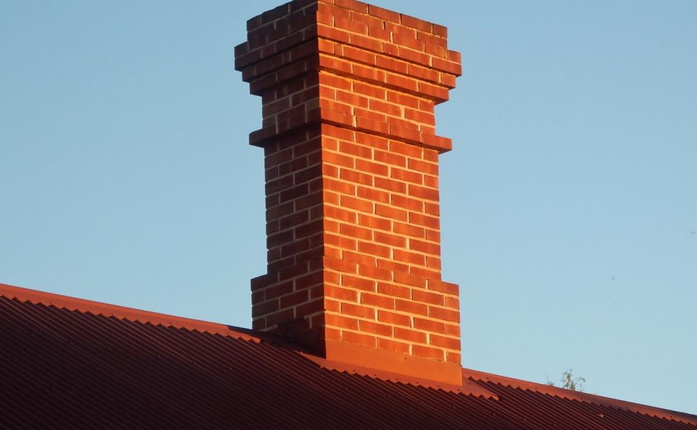Our experienced team specializes in chimney repairs, ensuring your fireplace is safe and functional. We offer professional masonry work to restore the beauty and functionality of your home's exterior. for NH Masonry & Construction in Nashua, NH