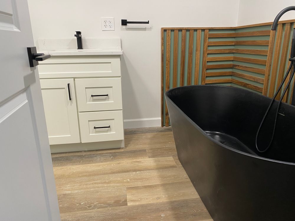Transform your bathroom into a modern oasis with our expert renovation services. We offer customized designs, quality craftsmanship, and seamless installation to enhance both functionality and aesthetic appeal. for Full Circle Design in Louisville, OH