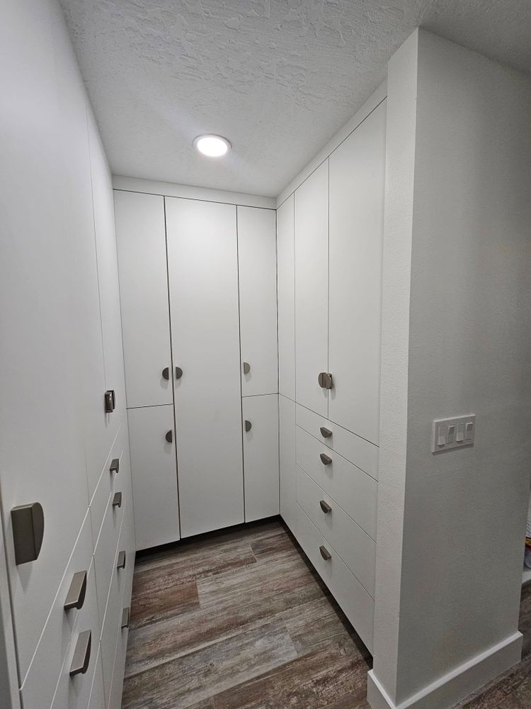 Enhance your home's organization with our expert closet system cabinet design and installation. Our tailored solutions complement your existing style, just like our transformative deck & patio installation services. for DR Cabinetry in Palm Bay, FL