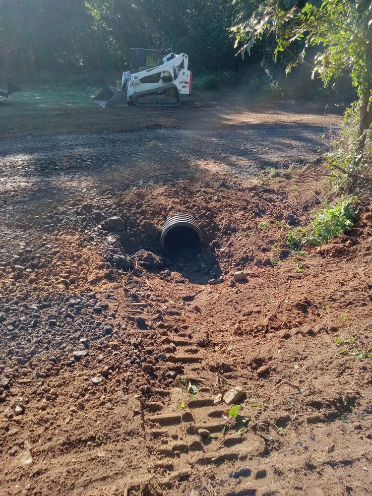 Our Tinhorn & Drainage service efficiently manages rainwater runoff, reducing erosion and flooding risks. We install durable tinhorns to protect your landscape while ensuring optimal water flow and environmental sustainability for homeowners. for McCormick Dozer Service in Bristow, OK