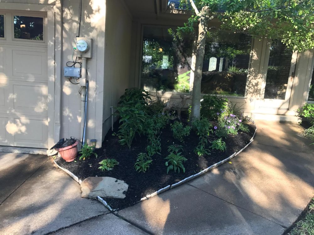 Enhance your garden's health and appearance with our professional mulch installation service, which retains soil moisture, suppresses weeds, and enriches plant vitality for a lush, well-maintained landscape all year round. for Tree Valley Landscaping in Dallas, TX