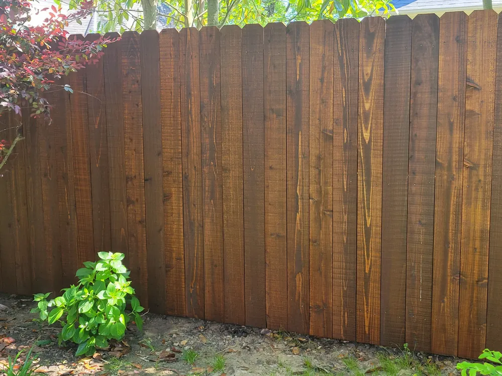 Enhance your home's beauty with our expert semi-transparent staining service, part of our comprehensive painting and staining offerings, providing a durable finish that highlights wood's natural texture and grain. for Champs Fencing in Dallas, TX
