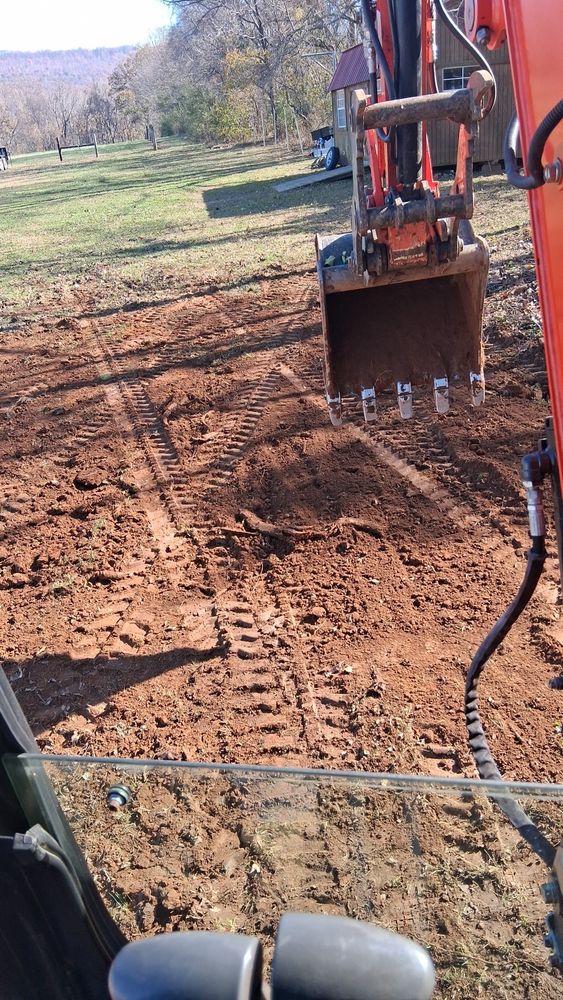 Our Grading and Leveling service ensures a stable and even foundation for your construction projects, enhancing drainage efficiency and preparing your land perfectly to meet all project specifications. for Willetts Excavation & Septic in McMinnville, TN