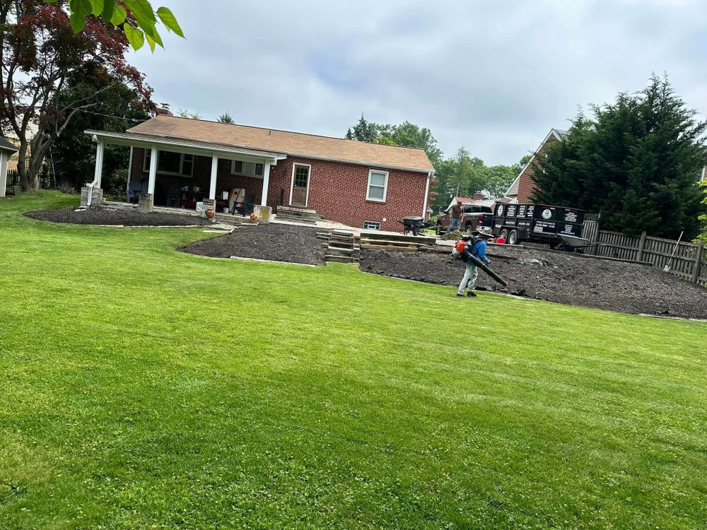 Our mowing service ensures a pristine lawn with precise cutting, edging, and clean-up. Enjoy a lush, well-maintained yard that enhances your home's curb appeal effortlessly and professionally. for Luna Landscaping and Construction in Parkville, MD