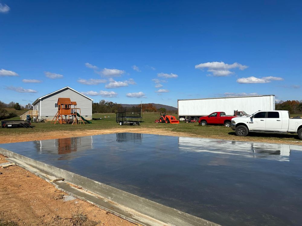 Our Concrete Slab Construction service delivers durable, precisely engineered slabs tailored to your home's needs, ensuring a stable foundation and aesthetic appeal. Trust us for expert craftsmanship and exceptional quality. for Whorley Concrete Construction in Goode, VA