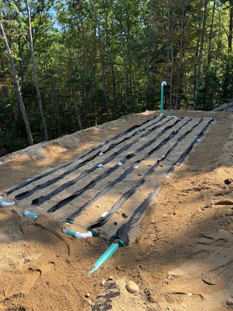 Our Sewer & Water Lines service offers expert installation, repair, and maintenance for reliable water flow and waste management, using advanced techniques to ensure minimal disruption and efficient solutions tailored to your home's needs. for AFH Earthworks in Madison, NH