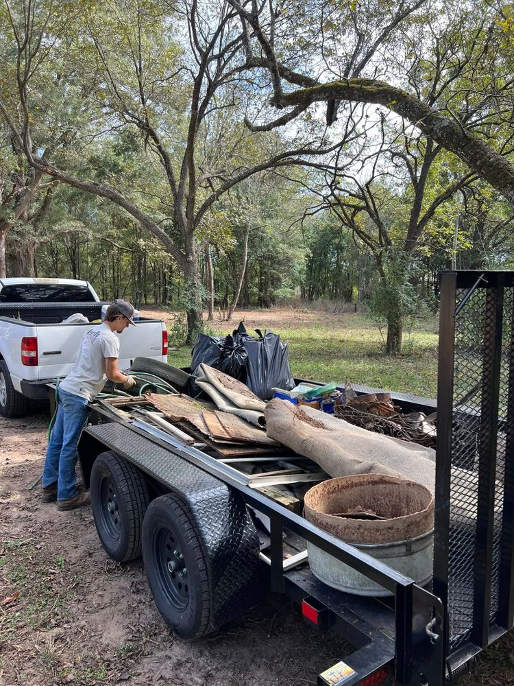 Our Junk Removal service efficiently clears unwanted items, ensuring a clean and clutter-free space, enhancing your property's appearance while you focus on enjoying your beautifully landscaped and hardscaped outdoor areas. for Foothills Landscape Solutions LLC in Inman, SC