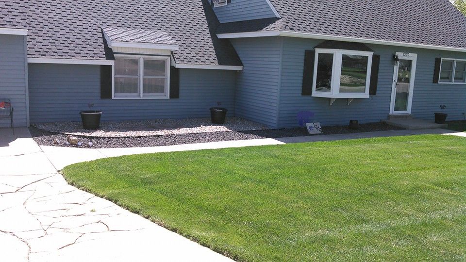 Our landscape design and installation service transforms your outdoor space with expert planning and superior craftsmanship, ensuring a beautiful, functional garden that enhances your home's curb appeal. for Taylor Landscapes in Colby,, KS