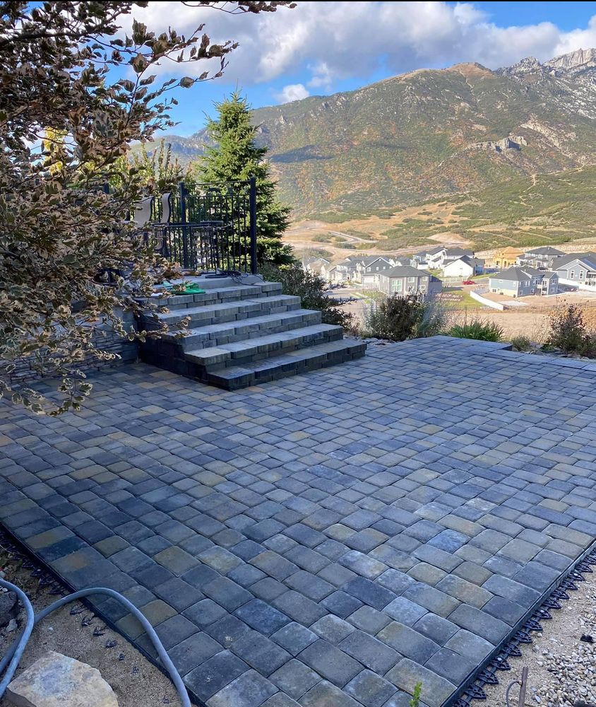 Enhance your outdoor living space with our Patio Design & Construction service, expertly crafted to blend beauty and functionality, creating a perfect setting for relaxation and entertainment in your backyard. for Pioneer Services Utah in Draper, UT