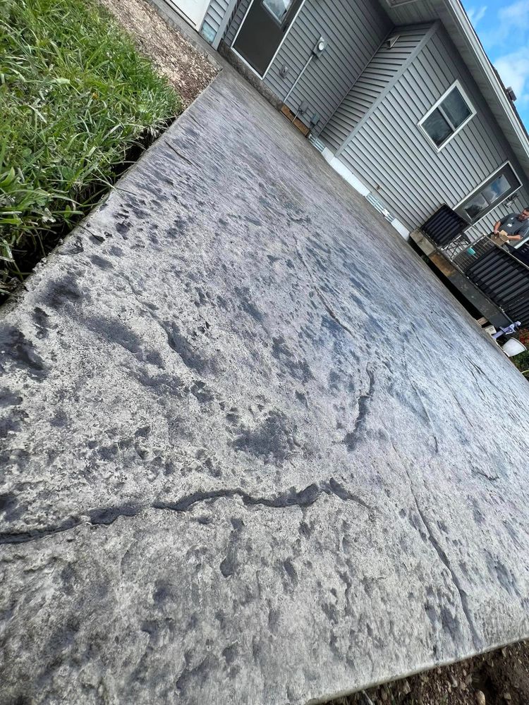 Transform your outdoor space with our expert stamped concrete installation, offering beautiful, durable surfaces that mimic natural stone at a fraction of the cost. Enhance your home’s curb appeal effortlessly. for ProStar Concrete & Masonry in Onamia, MN