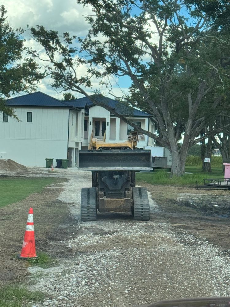 Our driveway construction service offers homeowners a professional and efficient solution for creating a durable and attractive driveway that enhances the curb appeal and functionality of their property. for Heverly Land Solutions in Winter Haven, FL