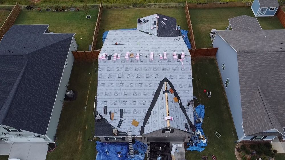 Our Roofing Replacement service offers top-quality materials and skilled craftsmanship to ensure your home's safety and aesthetic appeal, providing long-lasting protection against the elements while enhancing overall curb appeal. for Givins Roofing & Gutters in Cartersville, GA