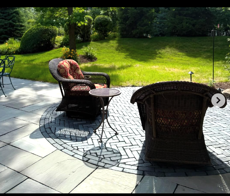 Enhance your home's exterior with our Outdoor Living Spaces Design service, creating customized, beautiful areas perfect for relaxation and entertaining while seamlessly integrating nature-inspired features into your backyard design. for Hillside Landscape Design in Parma,  OH
