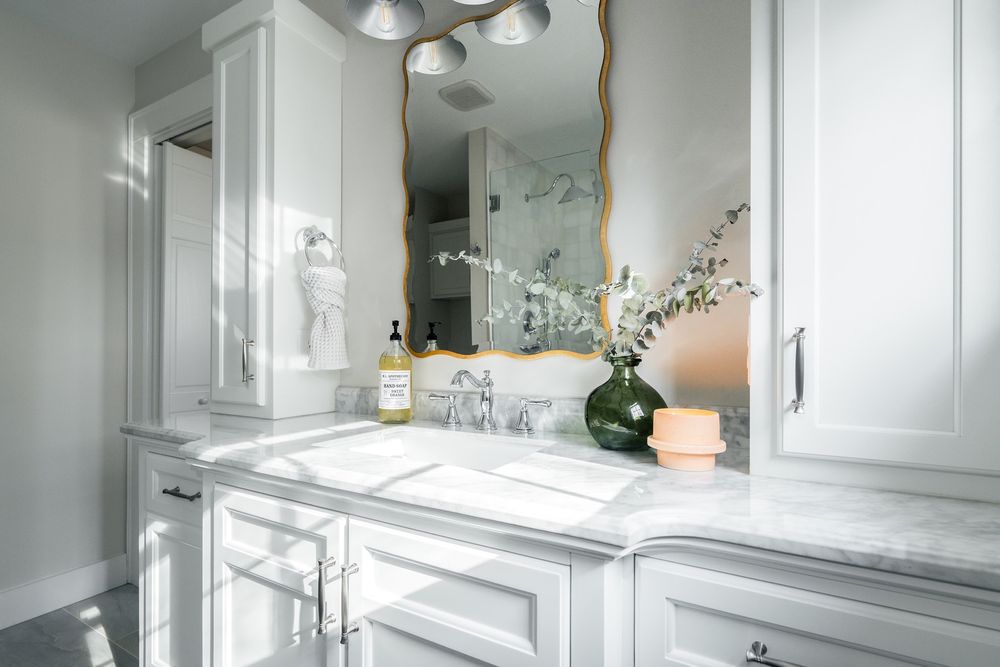 Bathroom design and renovations that blend beauty, comfort, and function. From layout and tile to cabinetry and fixtures, we create thoughtfully designed spaces that feel timeless, refined, and built for everyday living. for Hartman Homes and Interiors in Lexington, NC