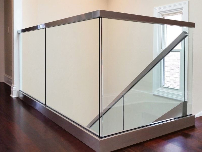 Enhance your home's elegance and safety with our premium glass railings. Offering modern design, durability, and unobstructed views, we are perfect for stairs, balconies, and decks in any residential setting. for Cross Iron Stairs LLC in Little Elm, TX