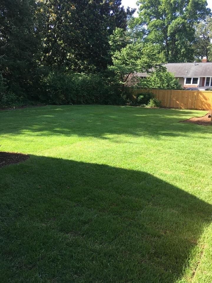 Transform your yard with our Sod Installation service. Our experienced team will lay fresh sod, creating a lush green lawn for you to enjoy. Contact us today for mulch installation options. for Paradise Landscaping and Tree Service in Greenville, SC