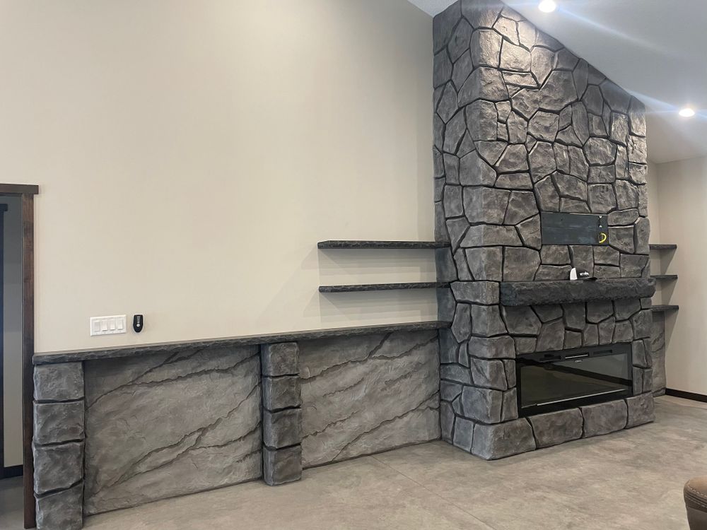 Interior fireplace & feature walls  for STAMPEDE Vertical Concrete in Isanti, Minnesota