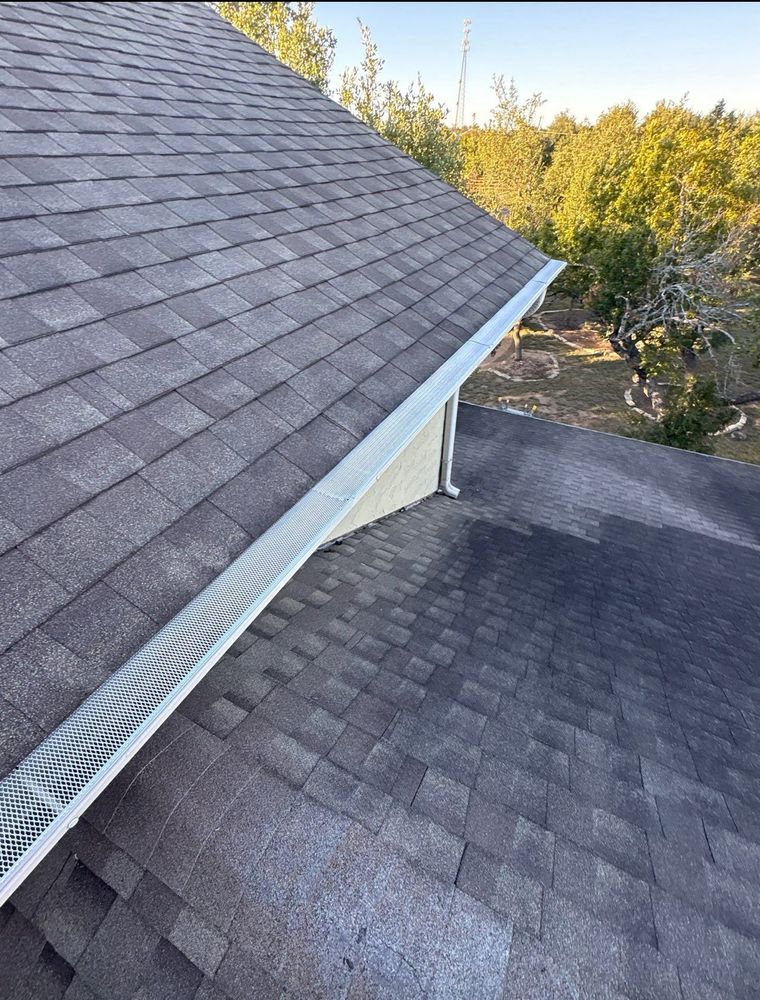 Our expert roofing installation service ensures durability and aesthetic appeal, perfectly complementing our comprehensive deck & patio installation offerings to enhance your home's outdoor living experience with quality craftsmanship. for LeBlanc Construction Services in Dripping Springs, TX