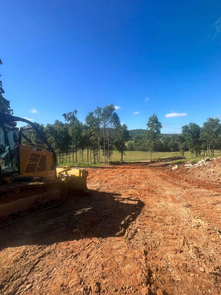 Our Land Clearing service efficiently prepares your site for new projects, ensuring safe and thorough removal of debris and trees to create a clean slate for construction. for Blair Excavation in Cookeville, TN