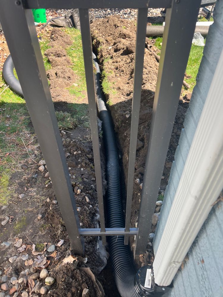 Buried downspouts for Alltimate Outdoor Services in Warren, MI